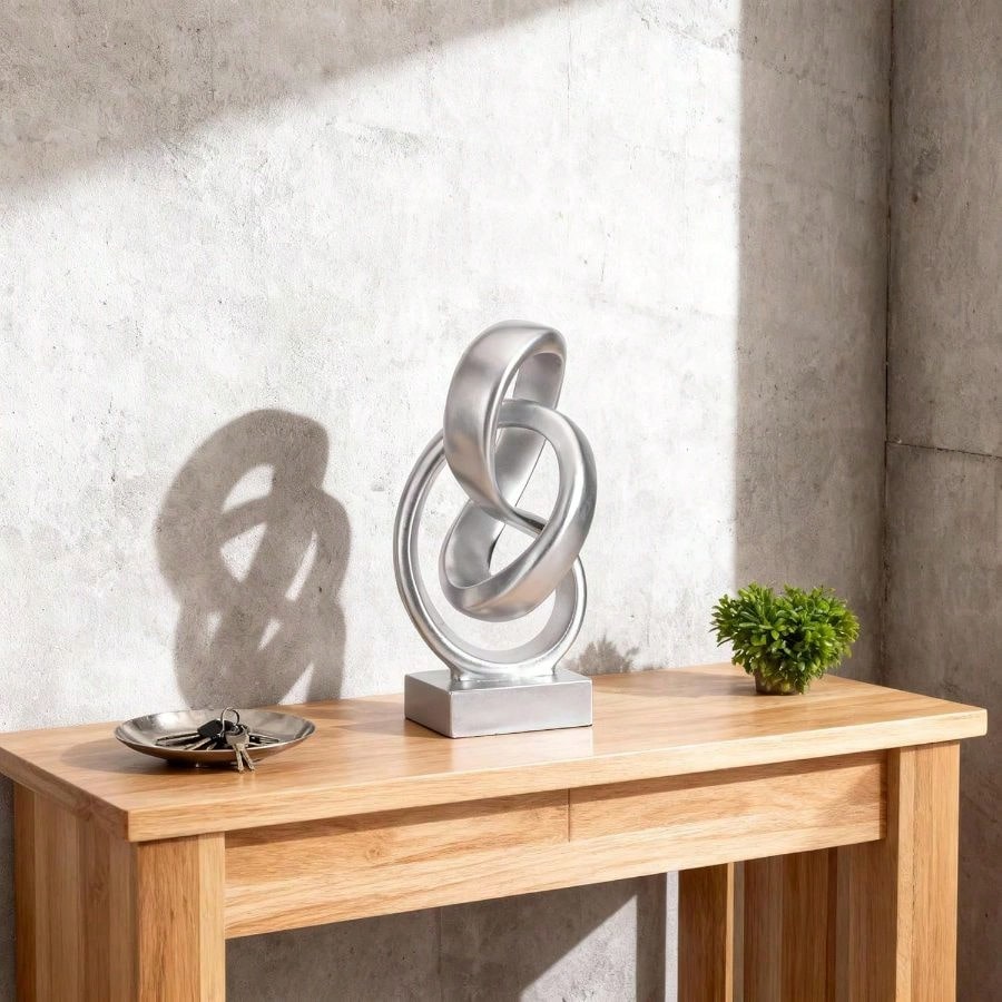 Abstract Silver Knot Sculpture - مراجعة Abstract Sculpture Resin وسعره